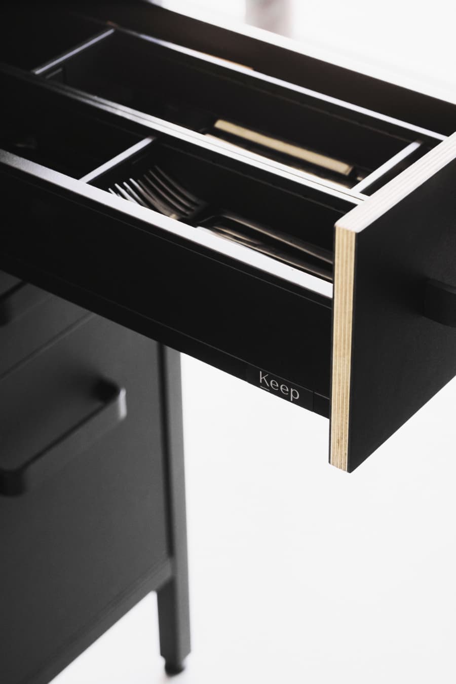 black-kitchen-from-keep-cutlery-drawer-in-detail